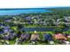 Beautiful lakefront home with pool and scenic views, located in a desirable neighborhood at 3895 Mimosa Pl, Palm Harbor, FL 34685