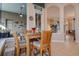 Breakfast nook with a view to the main room and lanai at 3895 Mimosa Pl, Palm Harbor, FL 34685