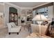 Cozy living room with view of open floor plan, fireplace and outdoor space at 3895 Mimosa Pl, Palm Harbor, FL 34685