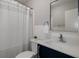 Modern bathroom with new vanity, large mirror, decorative tile and shower at 416 73Rd N Ave # 205, St Petersburg, FL 33702