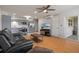 Open-concept living space features a modern kitchen flowing into a comfortably furnished living area at 416 73Rd N Ave # 205, St Petersburg, FL 33702