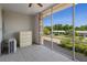 Screened porch with an outside view, tiled floor, and ceiling fan providing fresh air at 416 73Rd N Ave # 205, St Petersburg, FL 33702