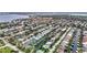 Aerial view of a waterfront community with private docks and canal access to the Gulf at 4306 Barracuda Dr, Bradenton, FL 34208