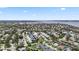 Aerial view of a waterfront community with private docks and water access nearby at 4306 Barracuda Dr, Bradenton, FL 34208