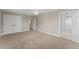 Bedroom with ensuite bathroom features closet, neutral paint and carpet at 4306 Barracuda Dr, Bradenton, FL 34208