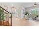 Sunlit living area boasts plantation shutters, tile flooring, and comfortable seating arrangement at 4306 Barracuda Dr, Bradenton, FL 34208
