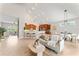 Spacious open-concept living room with a seamless flow to the kitchen and dining area, perfect for entertaining at 4306 Barracuda Dr, Bradenton, FL 34208