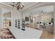 Elegant living room showcasing exquisite decor, chandelier lighting, and sophisticated seating arrangements at 4306 Barracuda Dr, Bradenton, FL 34208