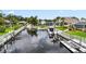 This waterfront property has a boat lift and dock for easy access to boating at 4306 Barracuda Dr, Bradenton, FL 34208