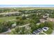 Neighborhood aerial view with mature trees and green spaces at 4312 E Shadowlawn Ave, Tampa, FL 33610