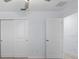 This bedroom features an overhead fan, ample wall space and closet with bi-fold doors at 4312 E Shadowlawn Ave, Tampa, FL 33610