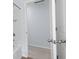 Walk in closet adjacent to the bathroom with an open door at 4312 E Shadowlawn Ave, Tampa, FL 33610