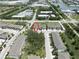 Community aerial view displaying townhomes in a well-maintained neighborhood setting and convenient access to nearby amenities and streets at 4504 Silver Lining St, Sarasota, FL 34238