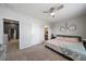 Bright bedroom featuring natural light, with ensuite bathroom and closet at 4504 Silver Lining St, Sarasota, FL 34238