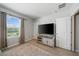 Comfortable bedroom with large window letting in plenty of natural light at 4504 Silver Lining St, Sarasota, FL 34238