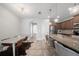 Bright dining area adjacent to kitchen, providing a seamless space for meals and gatherings at 4504 Silver Lining St, Sarasota, FL 34238