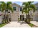 Inviting townhome with a two-car garage and meticulously maintained landscaping at 4504 Silver Lining St, Sarasota, FL 34238
