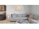 Comfortable living room with a sectional sofa and neutral decor, ideal for relaxing at 4504 Silver Lining St, Sarasota, FL 34238