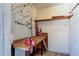 Functional garage space with pegboard wall and workbench for projects at 50 Ingrid Pl # 50, Oldsmar, FL 34677