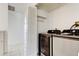 Convenient laundry room with modern washer and dryer units and extra storage at 50 Ingrid Pl # 50, Oldsmar, FL 34677