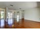 Spacious and bright living room showcasing hardwood floors and modern recessed lighting at 50 Ingrid Pl # 50, Oldsmar, FL 34677