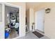 Laundry area off the covered porch with a full-size washer and dryer at 5109 N 30Th St, Tampa, FL 33610