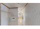 Hallway featuring modern lighting and passage to other rooms in the property at 5824 Coventry Dr, Tampa, FL 33615