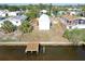 The rear exterior view of the property features a waterfront view and private dock at 5824 Coventry Dr, Tampa, FL 33615