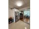 Kitchen with stainless steel refrigerator and a breakfast nook view at 5860 43Rd N Ter # 1518, Kenneth City, FL 33709