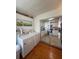 A laundry room, including a washer and dryer, leads into the kitchen at 5860 43Rd N Ter # 1518, Kenneth City, FL 33709