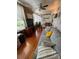 Sunroom area with bright windows, tile flooring, and comfortable seating at 5860 43Rd N Ter # 1518, Kenneth City, FL 33709