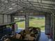 Metal building interior featuring a boat on a trailer with a view of the yard at 5926 Frontier Dr, Zephyrhills, FL 33540