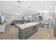 Spacious living area with open concept kitchen, dining area, and comfortable seating at 5926 Frontier Dr, Zephyrhills, FL 33540