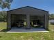 Two-bay steel structure in backyard of property at 5926 Frontier Dr, Zephyrhills, FL 33540