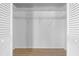 Walk-in closet with ample storage space and shelving at 6009 Cedarwood Ln, Bradenton, FL 34203
