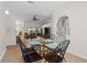 Open floor plan showcasing the dining room with a view of the living area at 6009 Cedarwood Ln, Bradenton, FL 34203