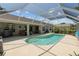 Relaxing screened-in pool area, perfect for enjoying outdoor living and entertaining at 6009 Cedarwood Ln, Bradenton, FL 34203