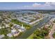 An aerial view of waterfront homes and canals with boats docked in the backyard and ocean nearby at 601 2Nd St, Indian Rocks Beach, FL 33785
