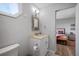 Bathroom featuring a decorative vanity and shower over tub at 601 2Nd St, Indian Rocks Beach, FL 33785