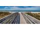 Boardwalk leading to beautiful beach with white sand and ocean views at 601 2Nd St, Indian Rocks Beach, FL 33785