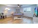 Cozy bedroom with a large window, stylish decor, and comfortable furnishings, perfect for relaxation at 601 2Nd St, Indian Rocks Beach, FL 33785