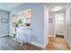 Bright open concept kitchen with breakfast bar and wood flooring at 601 2Nd St, Indian Rocks Beach, FL 33785