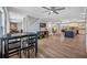 Bright and open living area with modern furnishings, a large TV, and natural light at 601 2Nd St, Indian Rocks Beach, FL 33785