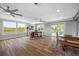 Spacious living room with multiple windows, and modern furnishings at 601 2Nd St, Indian Rocks Beach, FL 33785