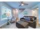 Inviting living room with stylish furniture, including a plush leather sofa and decorative pillows at 601 2Nd St, Indian Rocks Beach, FL 33785