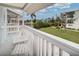 A cozy patio with views of lush greenery and a canal at 601 2Nd St, Indian Rocks Beach, FL 33785