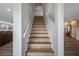 Stairway to the second level is conveniently located between the living room and kitchen areas at 601 2Nd St, Indian Rocks Beach, FL 33785