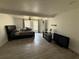 Comfortable bedroom with ceiling fan, neutral walls, and ample natural light at 6426 S Himes Ave, Tampa, FL 33611