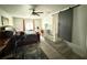 This bedroom offers great natural light, ceiling fan and hardwood floors at 6426 S Himes Ave, Tampa, FL 33611