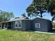 Charming home with a screened-in porch, perfect for enjoying the outdoors from the comfort of your home at 6426 S Himes Ave, Tampa, FL 33611